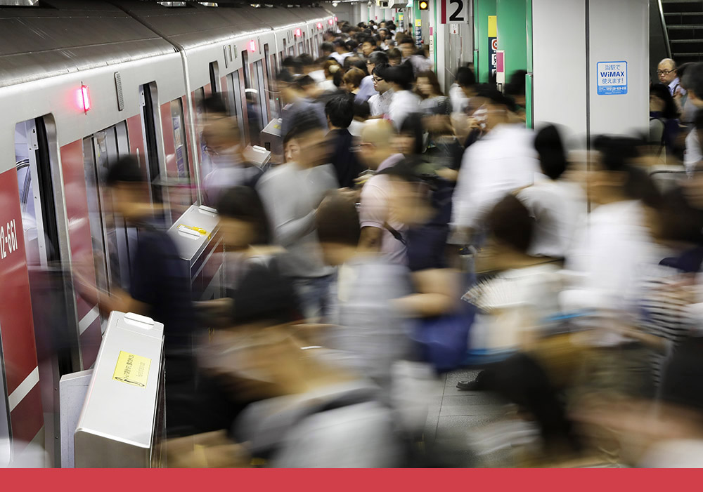 Tokio: Pendler auf dem Weg zu Arbeit, Foto: dpa